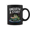 Unearth a Story Frog Reading a Book Summer 2026 Graphic Print Coffee Mug Unearth a Story Frog Reading a Book Summer 2026 Graphic Print Coffee Mug