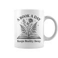 A Book A Day Keeps Reality Away Floral Reader Graphic Print Coffee Mug A Book A Day Keeps Reality Away Floral Reader Graphic Print Coffee Mug