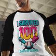 HUGvyn I Survived 100 Days Baseball Teacher Ice Cream Drip Baseball Raglan Shirt HUGvyn I Survived 100 Days Baseball Teacher Ice Cream Drip Baseball Raglan Shirt