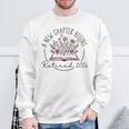 A New Chapter Retired 2026 Begins Retirement Wildflower Book Sweatshirt Gifts for Old Men A New Chapter Retired 2026 Begins Retirement Wildflower Book Sweatshirt Gifts for Old Men