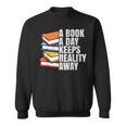 A Book A Day Keeps Reality Away Bookworm Sweatshirt