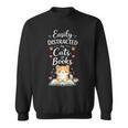 Easily Distracted By Cats And Books Cat & Book Lover Sweatshirt