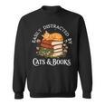 Easily Distracted By Cats And Books Cat And Book Lover Sweatshirt