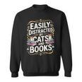 Easily Distracted By Cats And Books Sweatshirt