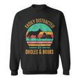 Easily Distracted By Dholes & Books Retro Wild Dogs Lover Sweatshirt