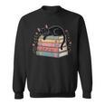Floral Cat Sleeping On Books Sweatshirt