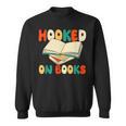 Hooked On Books Retro Reader Sweatshirt