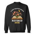 A New Chapter Begins Retired 2026 Floral Book Butterfly Tee Sweatshirt