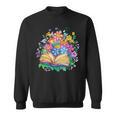 Open Book Surrounded By Colorful Spring Flowers Bloom Sweatshirt