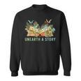 Unearth a Story Dinosaur 2026 Summer Reading Program Book Sweatshirt