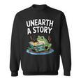 Unearth a Story Frog Reading a Book Summer 2026 Sweatshirt