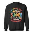 Unearth a Story Summer 2026 Summer Reading Program Book Sweatshirt