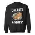 Unearth A Story Summer Reading Program 2026 Capybara Book Sweatshirt
