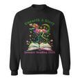 Women's Unearth A Story Summer Reading 2026 Dinosaur Book Floral Sweatshirt