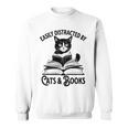 Easily Distracted By Cats And Books Book And Cat Lover Premium Tri-Blend Sweatshirt