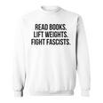 Read Books Lift Weights Fight Fascists Premium Tri-Blend Sweatshirt Read Books Lift Weights Fight Fascists Premium Tri-Blend Sweatshirt