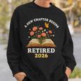 A New Chapter Begins Retired 2026 Floral Book Butterfly Tee Sweatshirt Gifts for Him