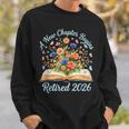 New Chapter Begins Retired 2026 Watercolor Floral Book Women Sweatshirt Gifts for Him