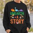 Summer Reading 2026 Dinosaurs Book Lover Unearth A Story Sweatshirt Gifts for Him Summer Reading 2026 Dinosaurs Book Lover Unearth A Story Sweatshirt Gifts for Him
