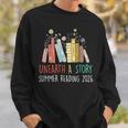 Unearth A Story Summer Reading 2026 Book Wildflowers Sweatshirt Gifts for Him Unearth A Story Summer Reading 2026 Book Wildflowers Sweatshirt Gifts for Him
