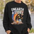 Women's Unearth A Story Rainbow Treasure Book Summer Reading 2026 Sweatshirt Gifts for Him Women's Unearth A Story Rainbow Treasure Book Summer Reading 2026 Sweatshirt Gifts for Him