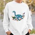 Unearth A Story Summer Reading 2026 Cute Plesiosaurus Book Sweatshirt Gifts for Him Unearth A Story Summer Reading 2026 Cute Plesiosaurus Book Sweatshirt Gifts for Him