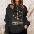 Astrologist Sitting On The Tower Of Stacked Up Books Starry Sweatshirt Gifts for Her