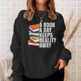 A Book A Day Keeps Reality Away Bookworm Sweatshirt Gifts for Her