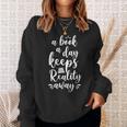 Book Reading A Book A Day Keeps Reality Away Sweatshirt Gifts for Her