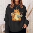 Capybara Reading a Book With Bubble Tea Sweatshirt Gifts for Her