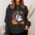 Ghost Reading Book On Swing Halloween Autumn Art Sweatshirt Gifts for Her