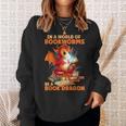Read Be A Book Dragon Bookworm Sweatshirt Gifts for Her