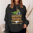 Unearth a Story Dinosaur Reading Books Summer 2026 Sweatshirt Gifts for Her Unearth a Story Dinosaur Reading Books Summer 2026 Sweatshirt Gifts for Her