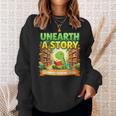 Unearth A Story Dinosaur Summer Reading 2026 Books Sweatshirt Gifts for Her Unearth A Story Dinosaur Summer Reading 2026 Books Sweatshirt Gifts for Her