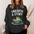 Unearth a Story Frog Reading a Book Summer 2026 Sweatshirt Gifts for Her