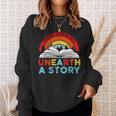 Unearth a Story Summer Reading 2026 Vintage Book Rainbow Sweatshirt Gifts for Her Unearth a Story Summer Reading 2026 Vintage Book Rainbow Sweatshirt Gifts for Her