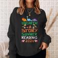Unearth A Story Summer Reading Program 2026 Dinosaur Book Sweatshirt Gifts for Her
