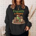 Women's Unearth a Story Summer 2026 Dinosaur Reading Books Dino Sweatshirt Gifts for Her