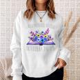 A New Chapter Begins Retired 2025 Floral Book Retirement Sweatshirt Gifts for Her