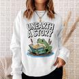 Unearth a Story Frog Reading a Book Summer 2026 Premium Tri-Blend Sweatshirt Gifts for Her Unearth a Story Frog Reading a Book Summer 2026 Premium Tri-Blend Sweatshirt Gifts for Her