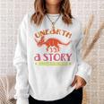 Unearth a Story Summer Reading 2026 Triceratops Dino Book Premium Tri-Blend Sweatshirt Gifts for Her Unearth a Story Summer Reading 2026 Triceratops Dino Book Premium Tri-Blend Sweatshirt Gifts for Her