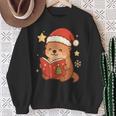 Cute Christmas Book Otter Reading Snowy Holiday Story Sweatshirt Gifts for Old Women