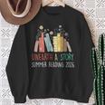 Unearth A Story Summer Reading 2026 Book Wildflowers Sweatshirt Gifts for Old Women Unearth A Story Summer Reading 2026 Book Wildflowers Sweatshirt Gifts for Old Women