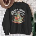 Unearth A Story Summer Reading 2026 Dinosaur Books Sweatshirt Gifts for Old Women Unearth A Story Summer Reading 2026 Dinosaur Books Sweatshirt Gifts for Old Women