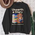 Women's Unearth A Story Reading Mammoth Prehistoric Book Librarian Sweatshirt Gifts for Old Women
