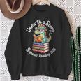 Women's Unearth a Story Summer Reading 2026 Book Lover Dino Fun Sweatshirt Gifts for Old Women
