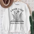 A Book A Day Keeps Reality Away Floral Reader Sweatshirt Gifts for Old Women