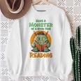 Halloween Teacher Librarian Monster Reading Books Performance Sweatshirt Gifts for Old Women Halloween Teacher Librarian Monster Reading Books Performance Sweatshirt Gifts for Old Women