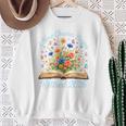 New Chapter Begins Retired 2026 Watercolor Floral Book Women Premium Tri-Blend Sweatshirt Gifts for Old Women