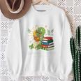 Unearth a Story Triceratops Dinosaur Reading Books Cute Dino Premium Tri-Blend Sweatshirt Gifts for Old Women